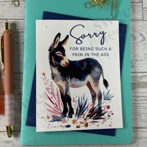 Greeting card featuring a cute donkey with message "Sorry for being such a pain in the ass."