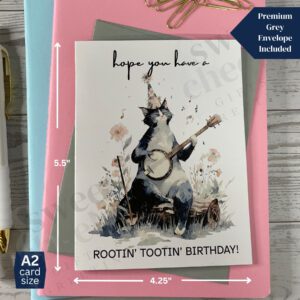 Greeting card featuring Rootin' Tootin' Birthday Country cat playing blue grass banjo in the woods