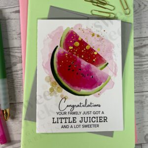 greeting card featuring the message "congratulations your family just got a little juicier and a lot sweeter" and slices of juicy watermelon