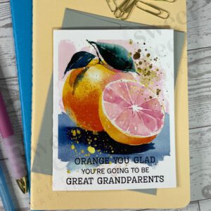 Fruit filled greeting card featuring message "orange you glad you're going to be great grandparents"