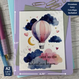 New baby greeting card featuring hot air balloon stars hearts clouds and the moon with message "and so the adventure begins"