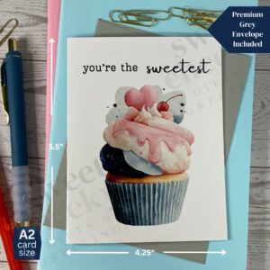 Greeting card featuring a sweet cupcake with frosting decorations and a cherry on top and says "you're the sweetest"