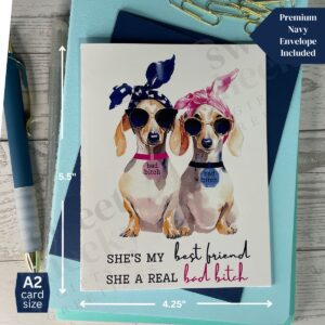 greeting card with two cute weenie dogs with message "She's by best friend, she's a real bad bitch"